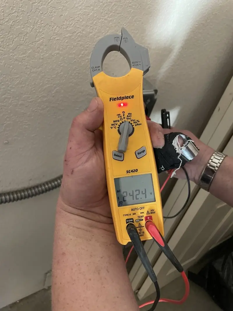 Voltage testing with clamp meter during Electrical Installation Services in South San Francisco